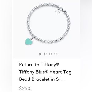 Tiffany’s beaded silver bracelet. In perfect condition. Blue heart detail.